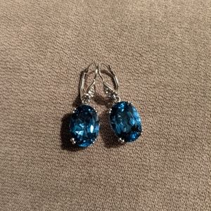 Sterling silver earrings with blue stone